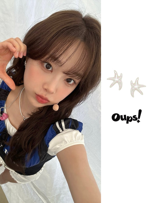 CHUU from LOONA Wears Dancing Starfish Earrings